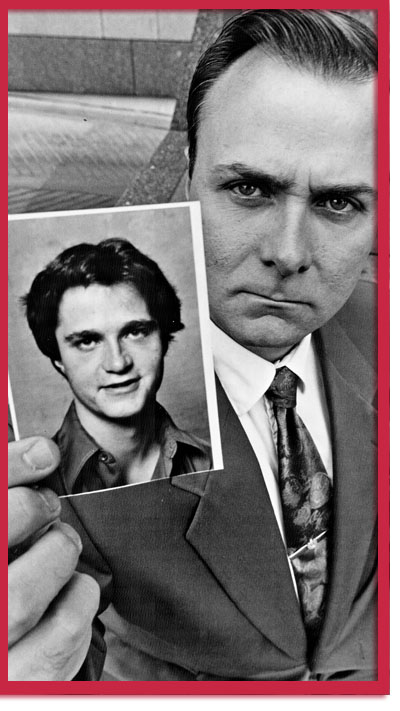 Black and white photo of Pat Hebert (OPP) holding photo of brother Donald Hebert by Mike Slaughter